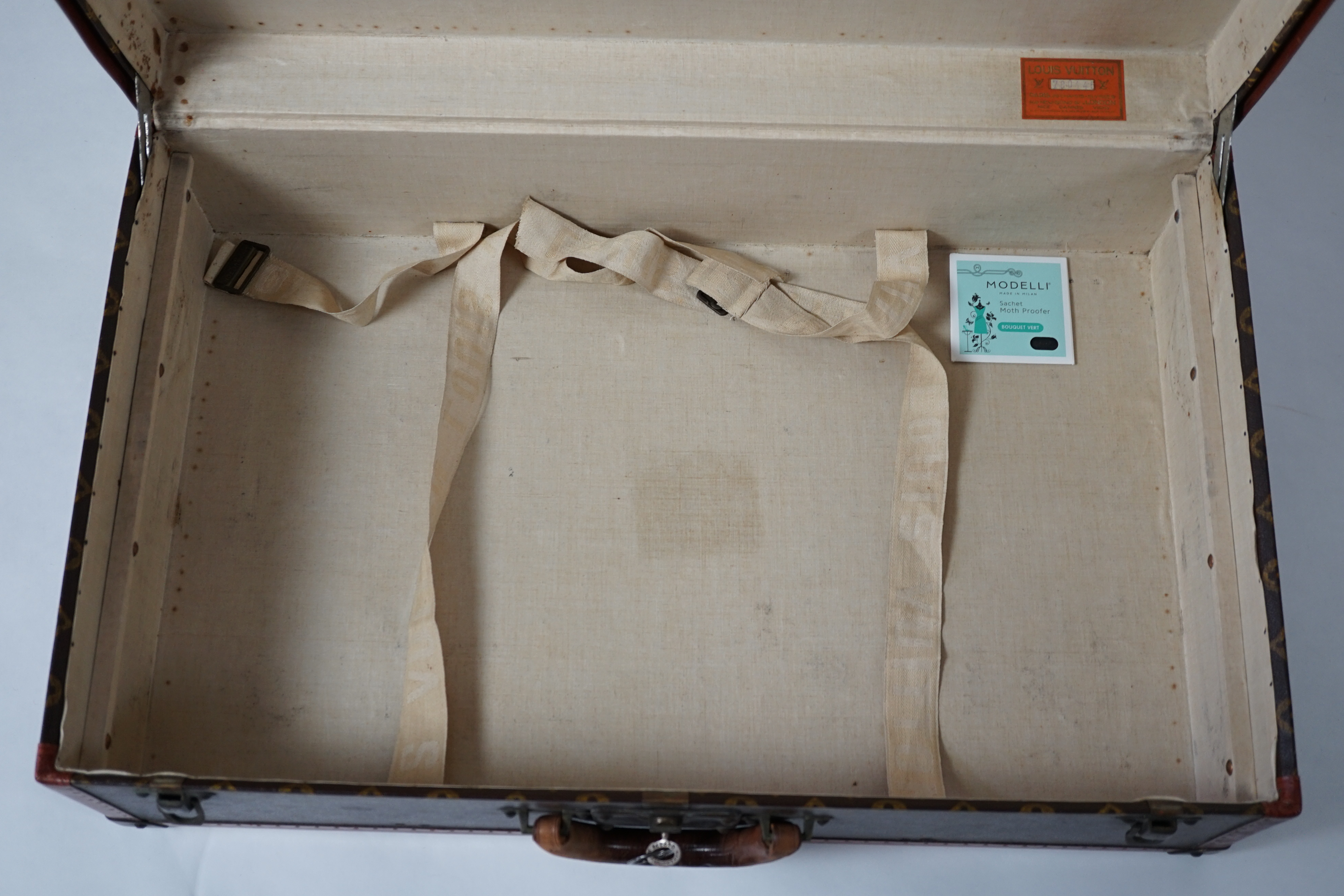 A vintage Louis Vuitton monogram canvas suitcase, 71cm x 44cm x 22cm